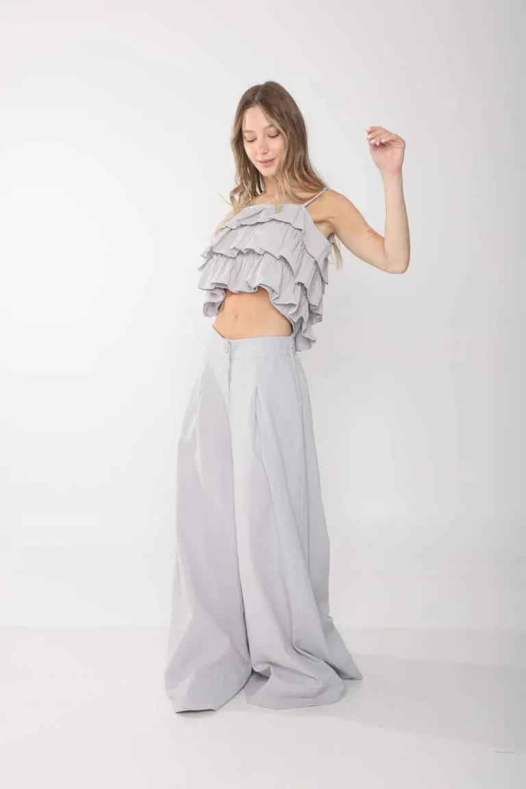 Pantalones amplios de lino con cintura elástica y botón a tono de Belle en Pantalones para argentina