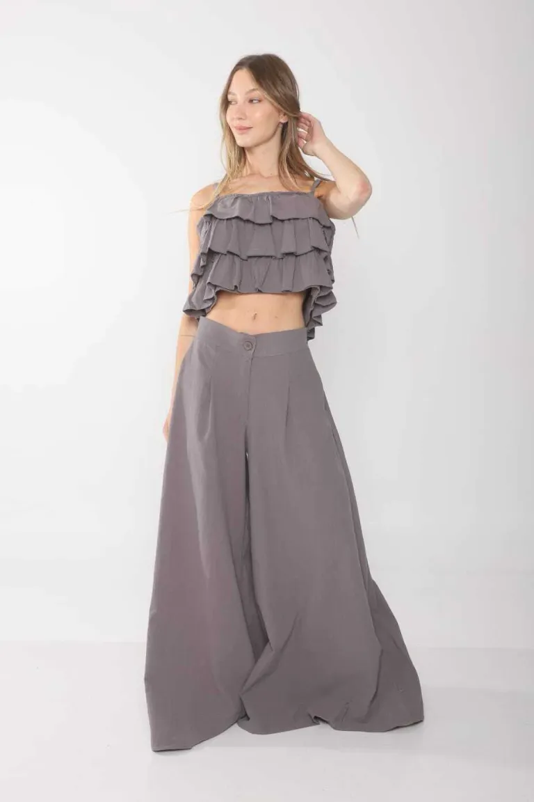 Pantalones amplios de lino con cintura elástica y botón a tono de Belle en Pantalones para argentina