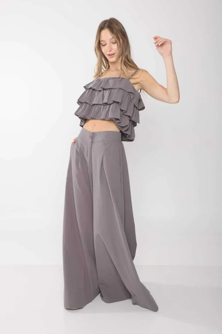 Pantalones amplios de lino con cintura elástica y botón a tono de Belle en Pantalones para argentina