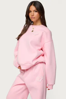 Buzo oversize love de Edikted en Buzos y Sweaters para argentina