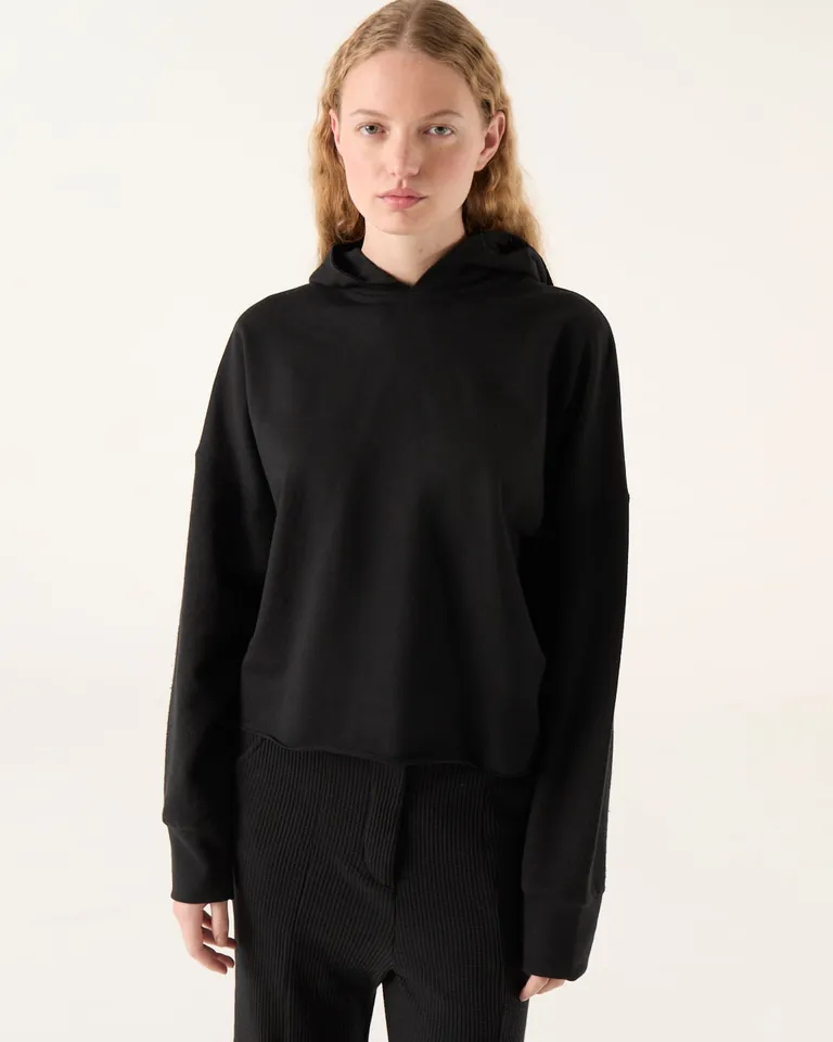 Buzo con capucha de calce holgado y mangas largas con terminaciones al corte de Furzai en Buzos y Sweaters para argentina