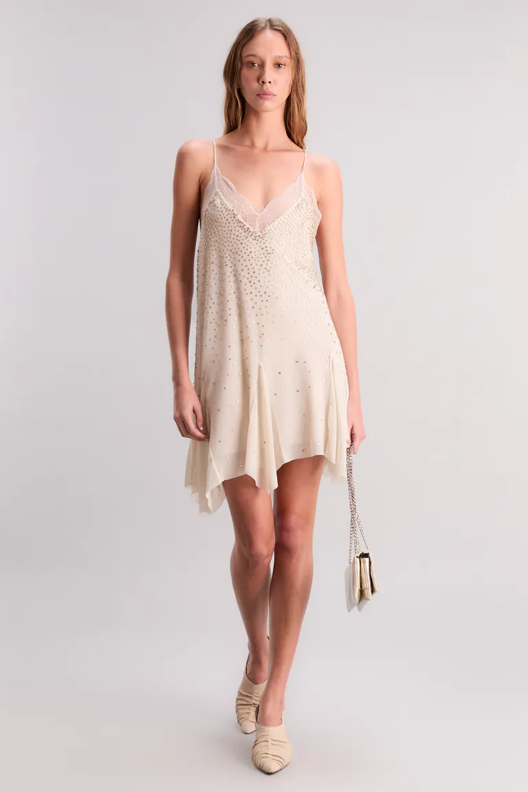 Vestido corto y suelto con detalles de tachas y puntilla de Kosiuko en Vestidos para argentina