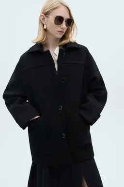 Abrigo midi lana botones de Mango en Chaquetas para argentina