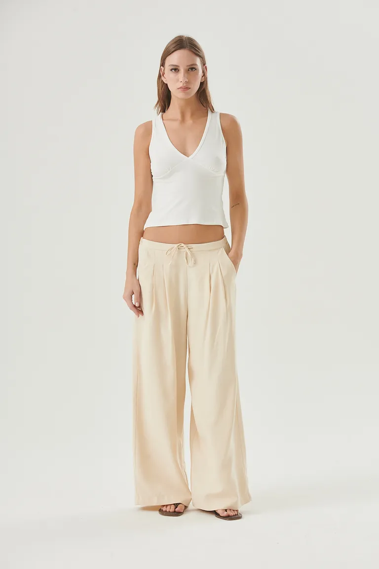 Pantalón lino de pierna ancha y cintura elastizada para un look elegante y versátil de Sweet en Pantalones para argentina