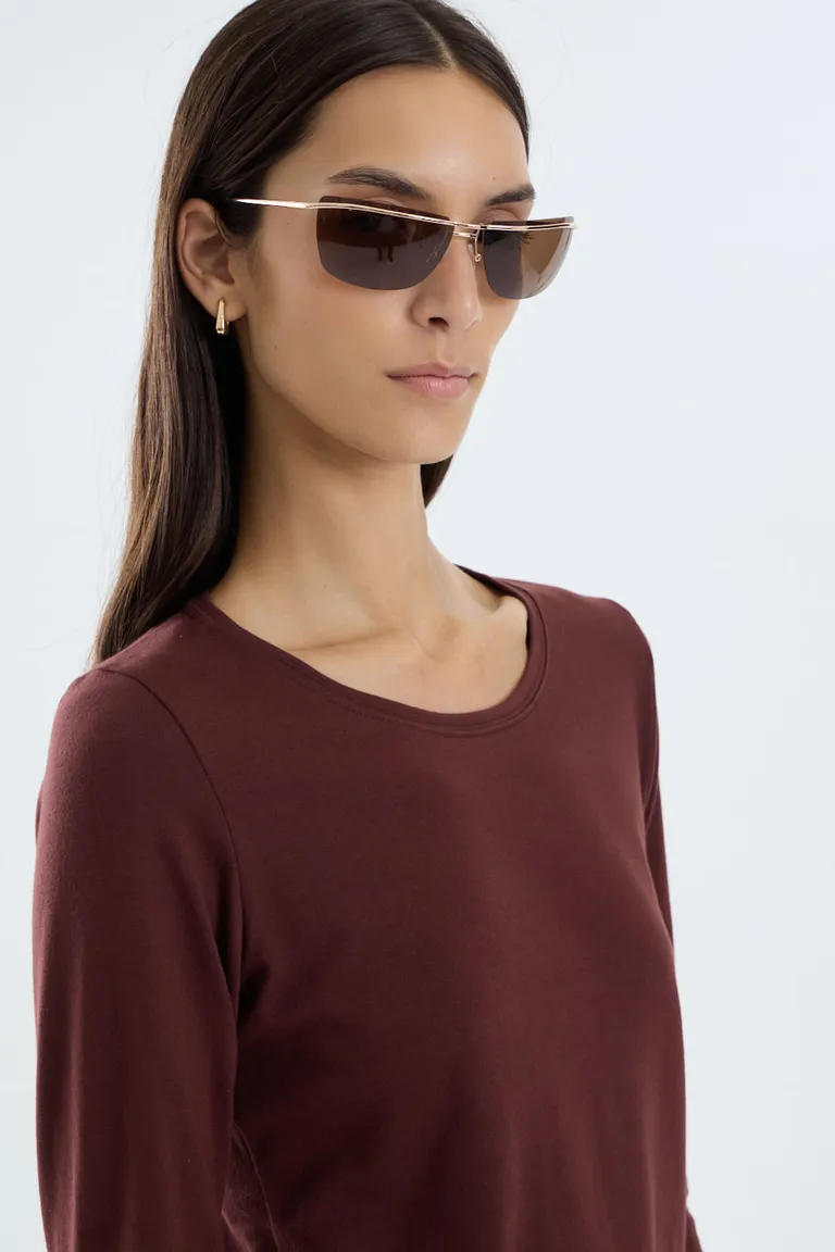 Remera de manga larga para mujer con cuello redondo y diseño liso de Portsaid en Remeras para argentina