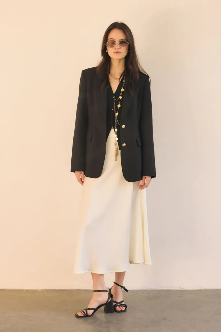 Falda larga y modular midi, con corte elegante y diseño versátil de Portsaid en Faldas para argentina