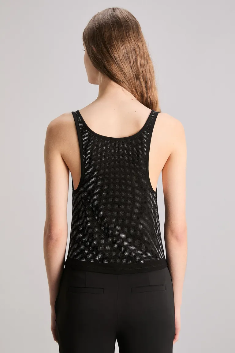 Top de tul con detalles metálicos, diseño slim y elegante para ocasiones especiales de Kosiuko en Tops para argentina