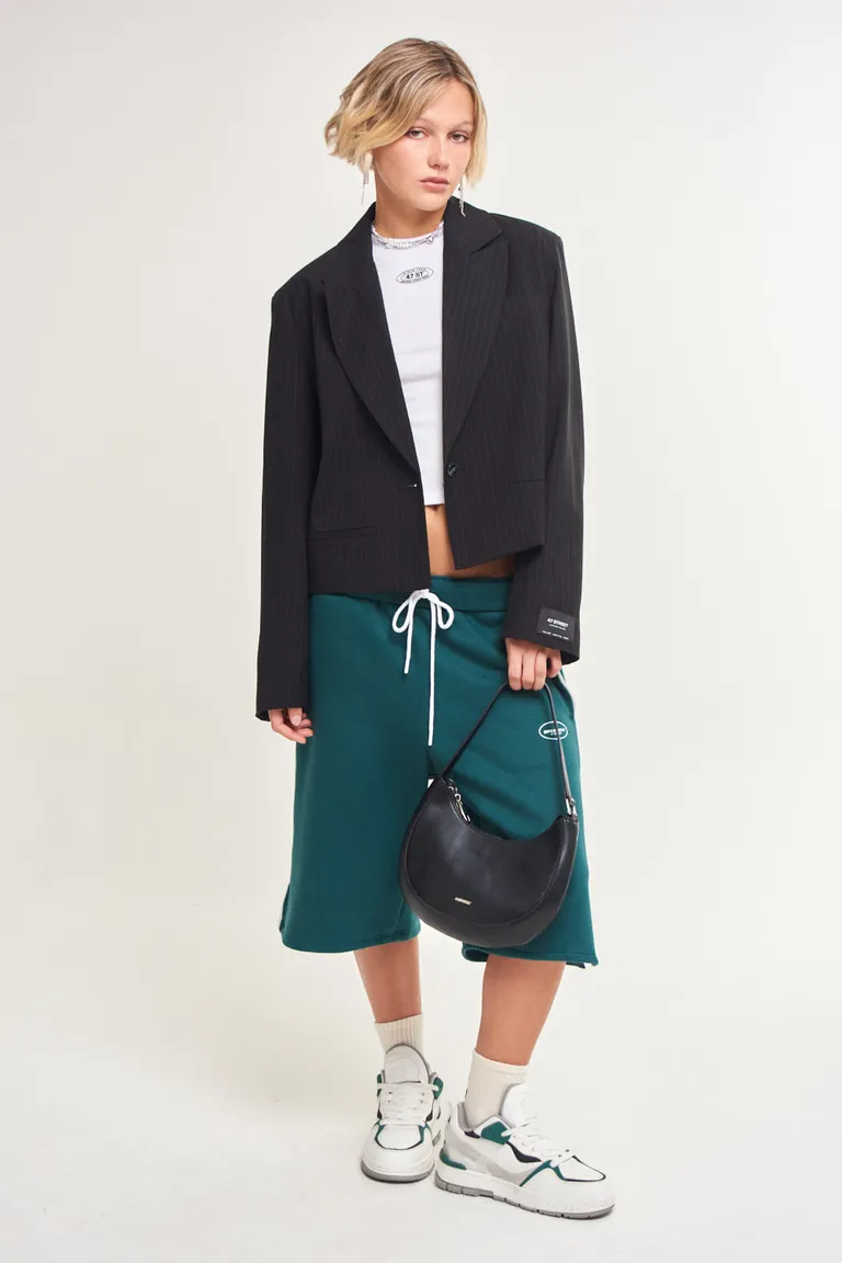 Bermuda con cintura elástica y cordones, bolsillos y detalles a contraste de 47 Street en Pantalones para argentina