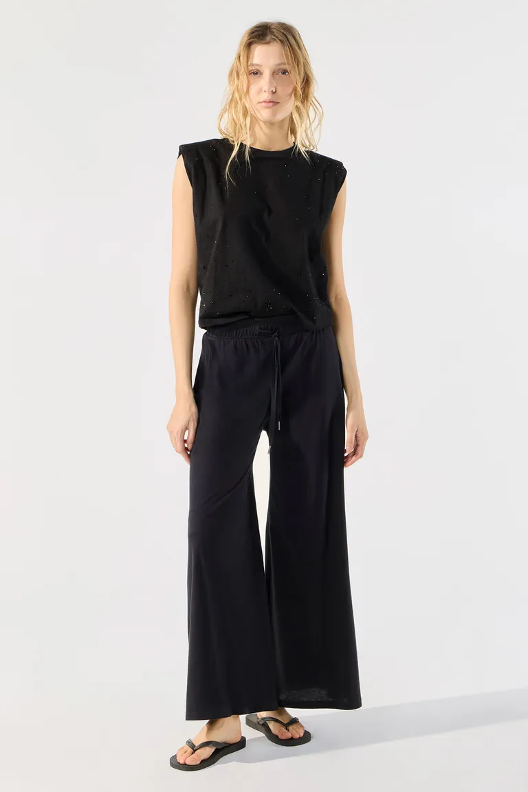 Pantalón negro de tiro alto estilo palazzo en algodón con cintura ajustable de Cuesta Blanca en Pantalones para argentina