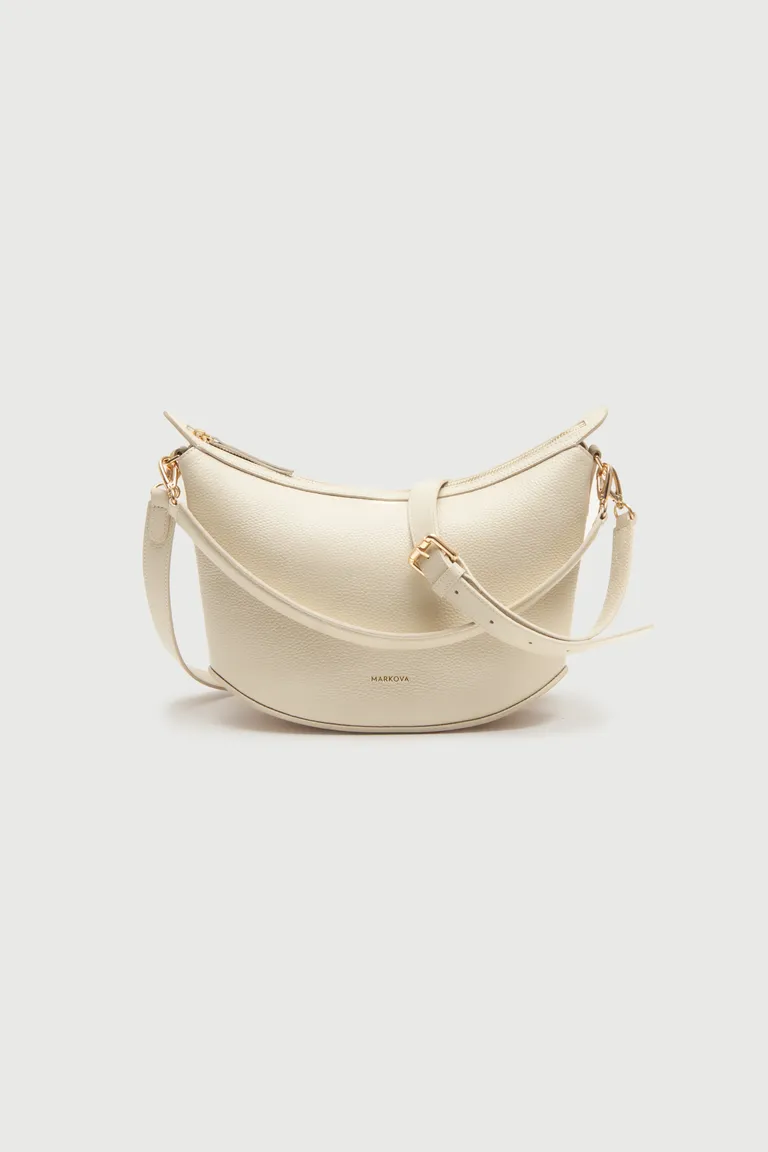 Cartera de cuero beige de doble compartimento con correa ajustable para uso versátil de Markova en Bolsos y Carteras para argentina
