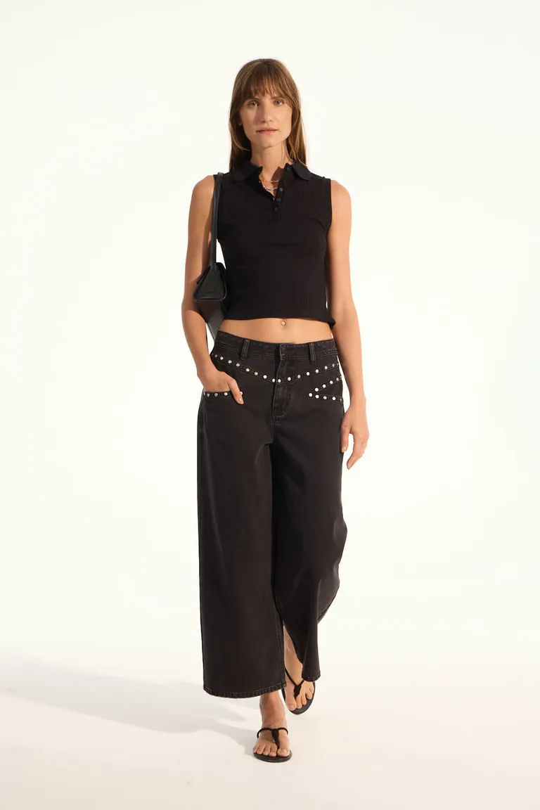 Remera de mujer sin mangas con cuello polo y cierre delantero con botones de Portsaid en Remeras para argentina