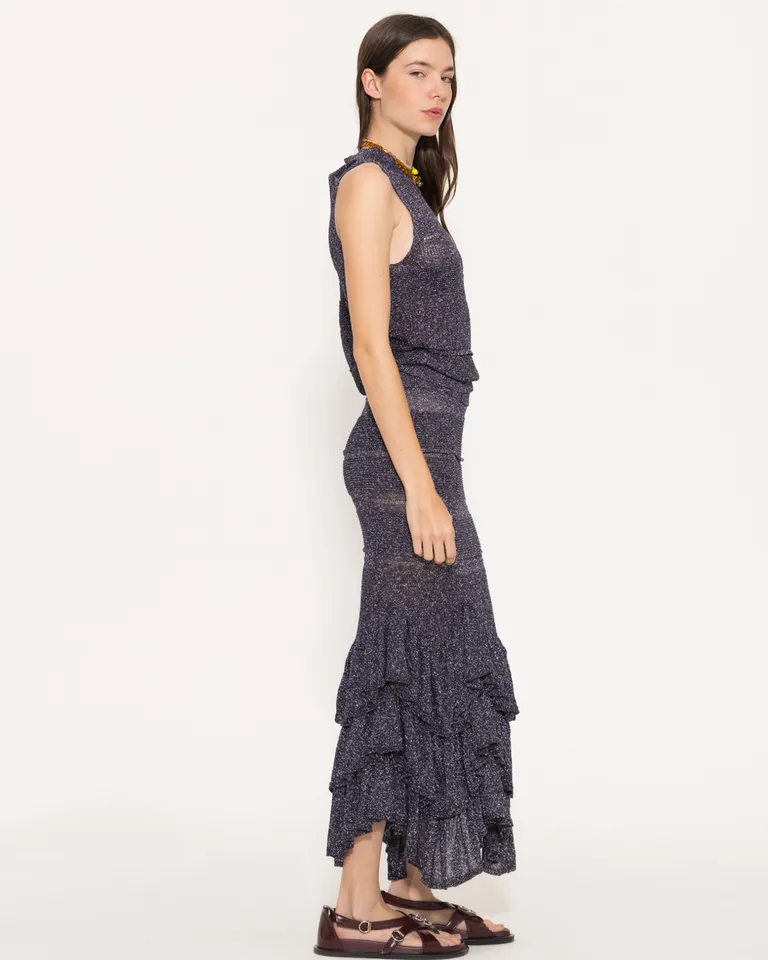 Top gris con detalles metálicos, diseño versátil y cómodo para un estilo chic de Jazmin Chebar en Tops para argentina