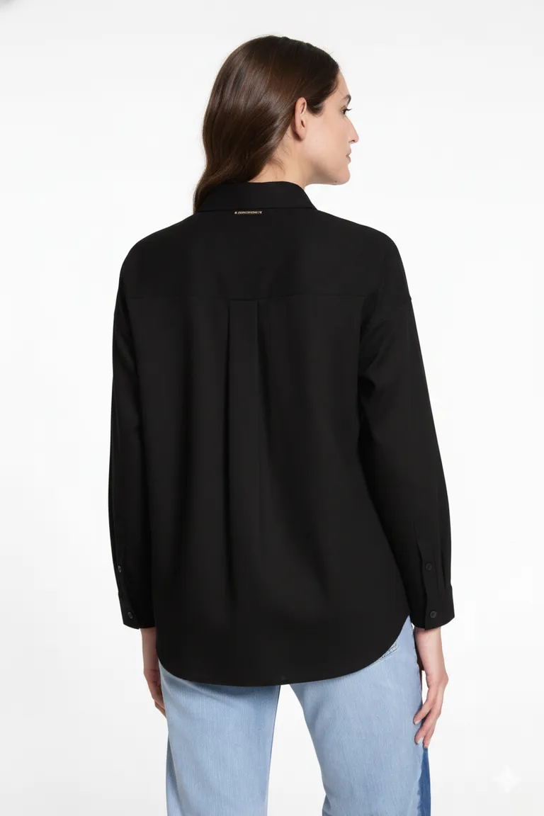 Camisa negra de lino con diseño volumétrico en las mangas de Justaosadia en Camisas para argentina