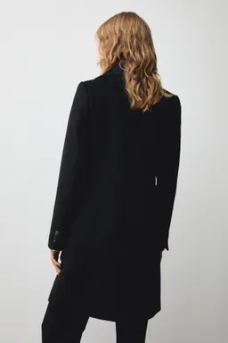 Abrigo midi lana doble botonadura de Mango en Chaquetas para argentina