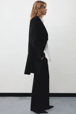 Abrigo midi lana doble botonadura de Mango en Chaquetas para argentina