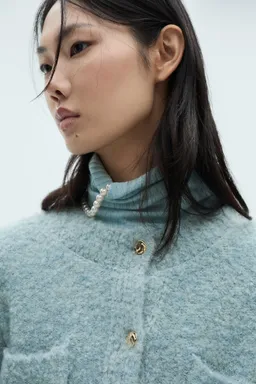 Chaqueta bouclé botones joya de Mango en Chaquetas para argentina