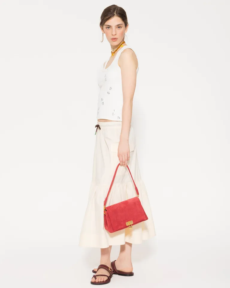 Top de mujer blanco con lentejuelas, corte ajustado y escote redondo de Jazmin Chebar en Tops para argentina