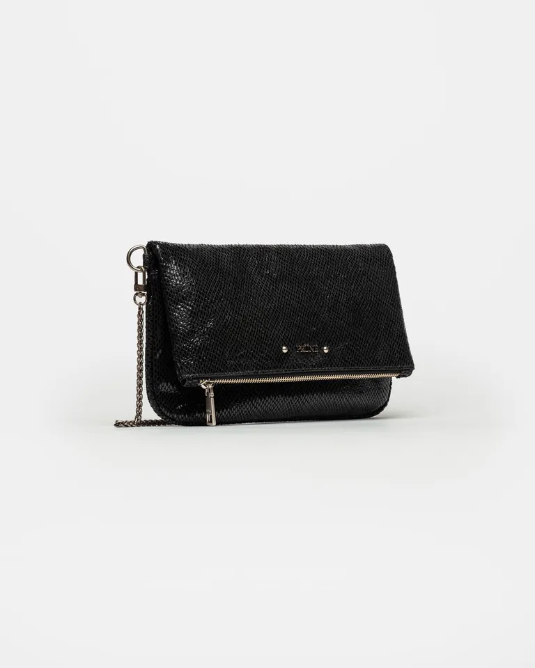 Elegante bolso bandolera de cuero grabado con diseño versátil y acabado sofisticado de Prüne en Bolsos y Carteras para argentina