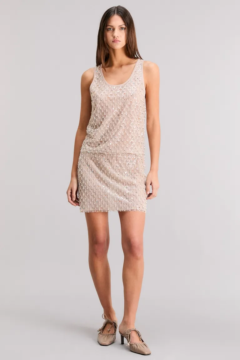 Musculosa intimacy: Elegante vestido de tul bordado con piedras nácar y forro a tono de Kosiuko en Vestidos para argentina