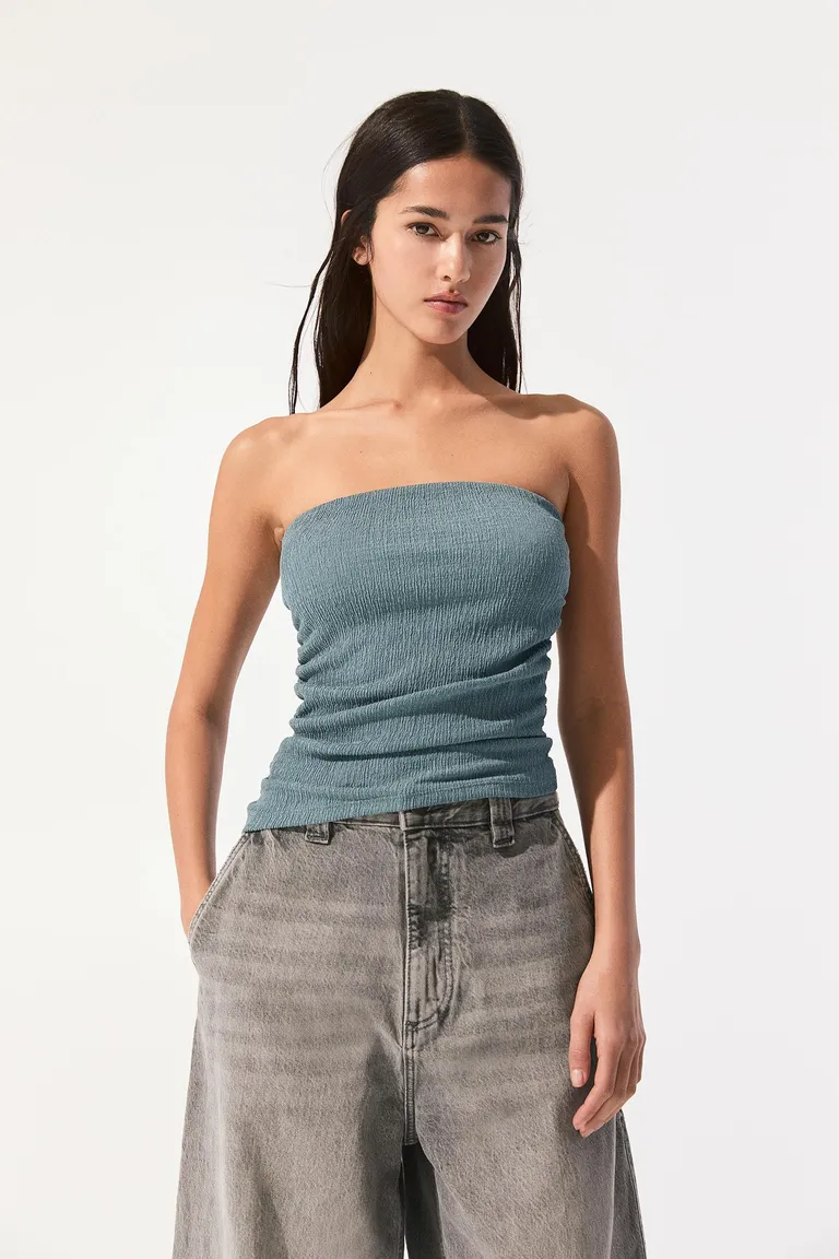 Top palabra honor asimétrico de Pull&Bear en Tops para argentina
