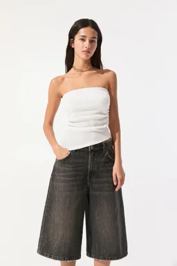 Top palabra honor asimétrico de Pull&Bear en Tops para argentina
