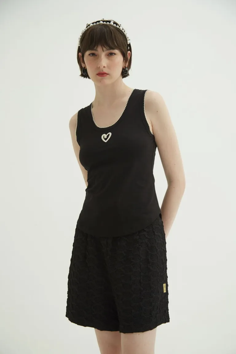 Top de algodón negro sin mangas con detalles bordados en el pecho de Las Pepas en Tops para argentina