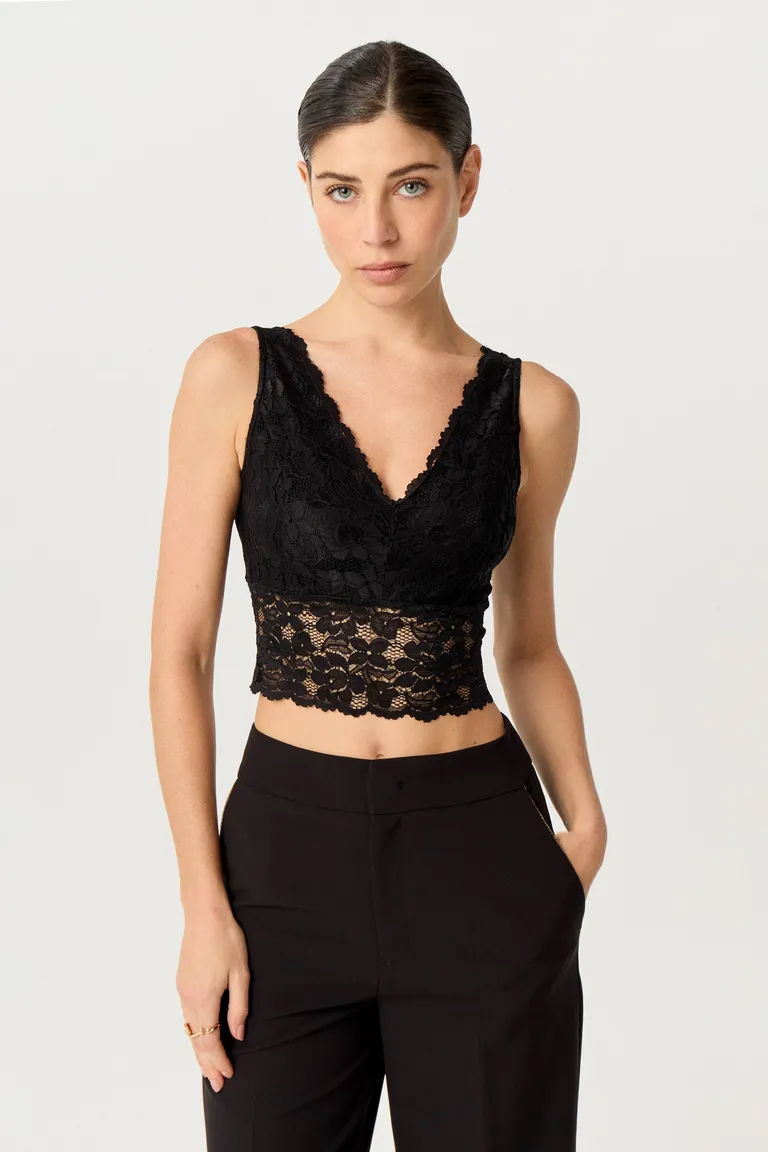 Top de encaje negro de diseño anatómico con escote en V y detalles de puntilla de Markova en Tops para argentina