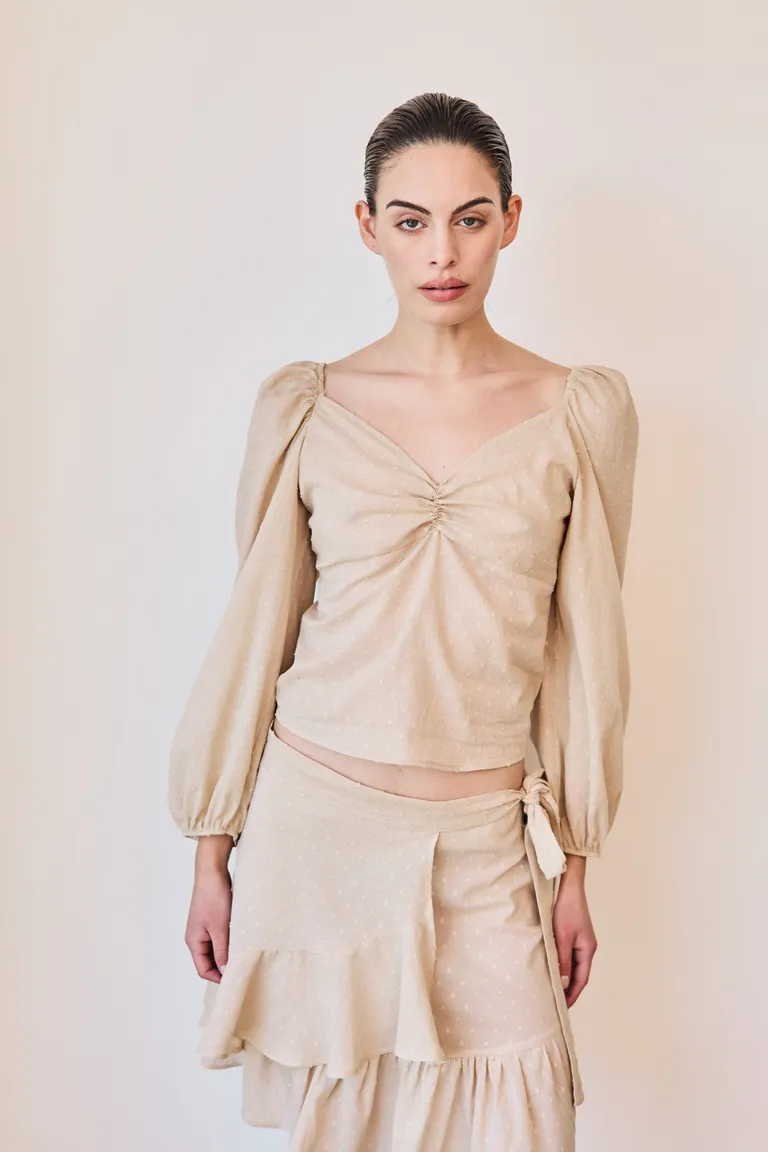 Falda cruzada de algodón con volado en el ruedo, perfecta para crear looks elegantes y femeninos de Justaosadia en Faldas para argentina