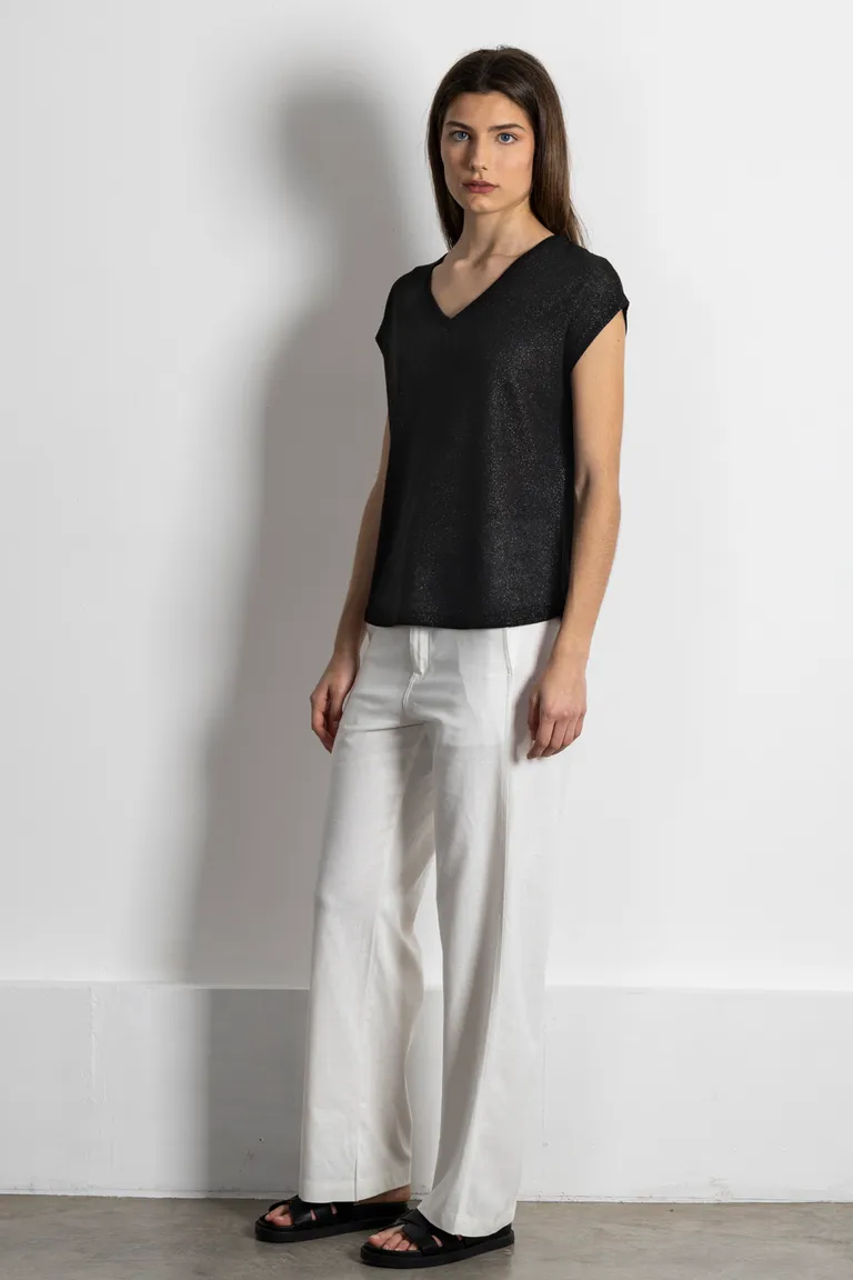 Remera negra de manga corta con detalles brillantes y silueta holgada de Kill en Remeras para argentina