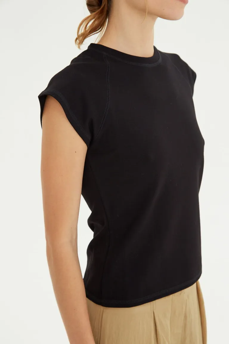 Remera básica de corte al cuerpo con escote redondo y mangas cortas raglán hasta la cadera de Las Pepas en Remeras para argentina