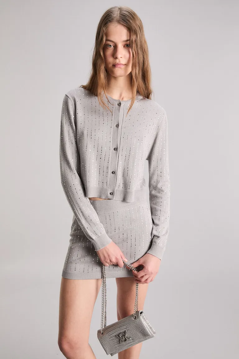 Cárdigan de punto gris con cierre y diseño exclusivo de Kosiuko en Buzos y Sweaters para argentina