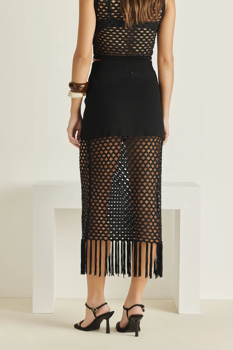 Falda de tejido a crochet con aplicaciones de strass y flecos de Tucci en Faldas para argentina
