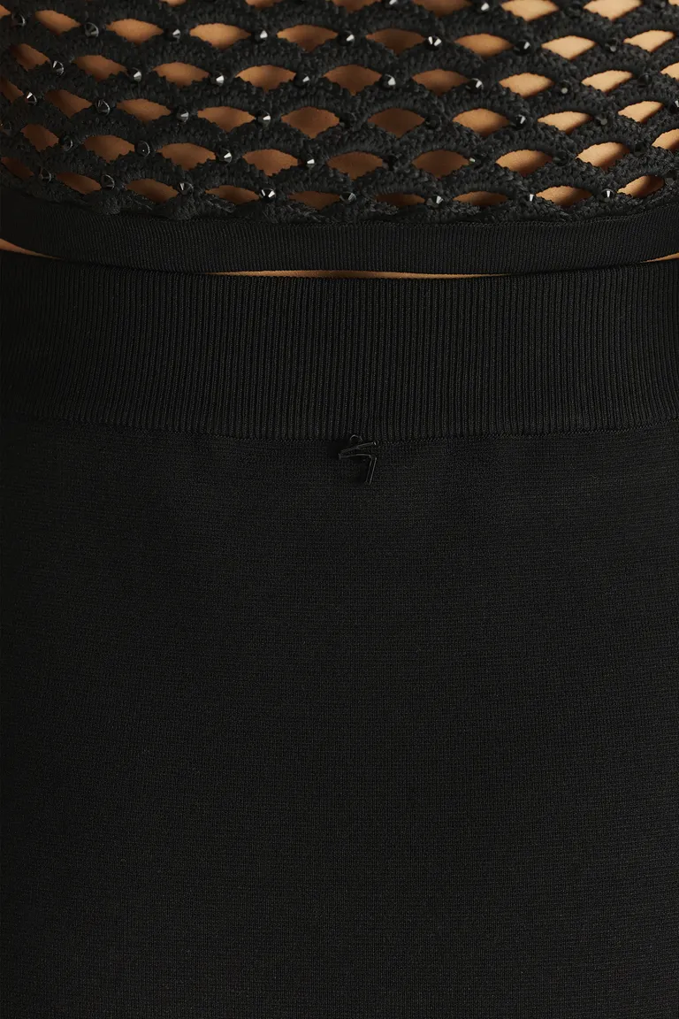 Falda de tejido a crochet con aplicaciones de strass y flecos de Tucci en Faldas para argentina