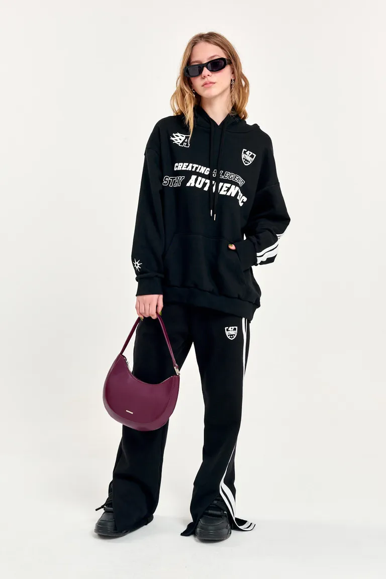 Canguro negro de diseño pesado y cómodo para mujer de 47 Street en Buzos y Sweaters para argentina