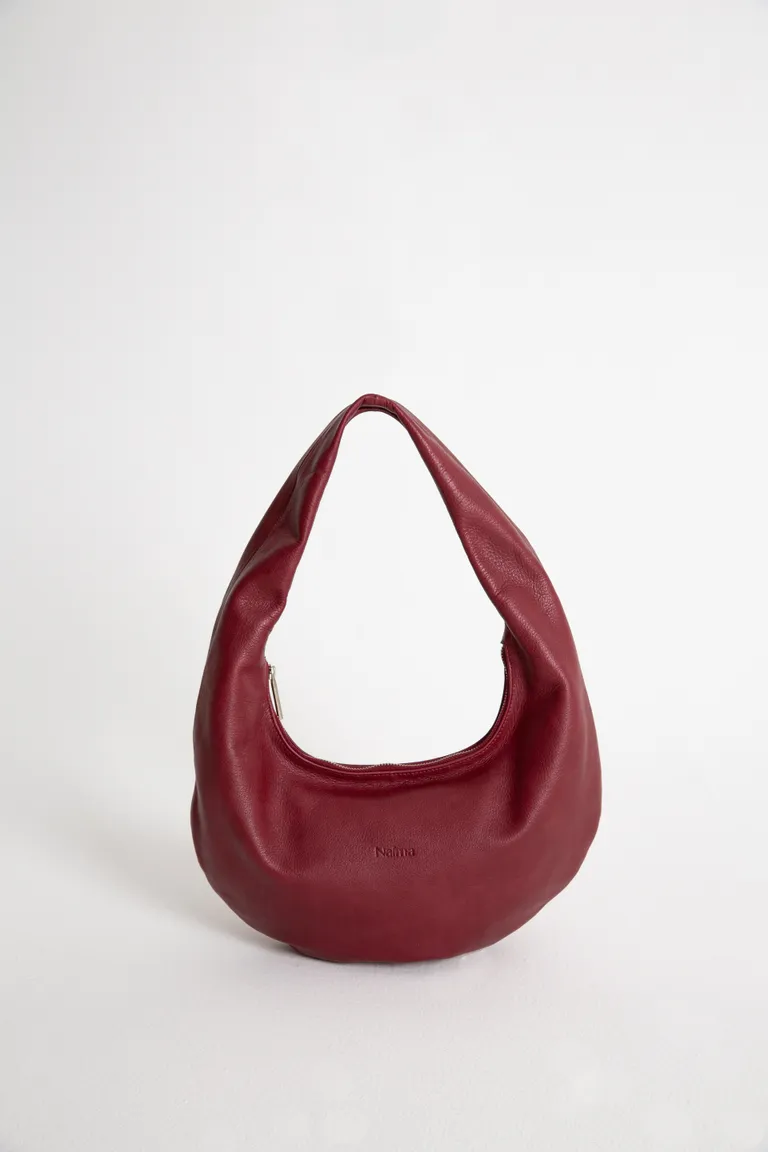 Cartera de mano mediana con cierre personalizado y diseño minimalista de Naíma en Bolsos y Carteras para argentina