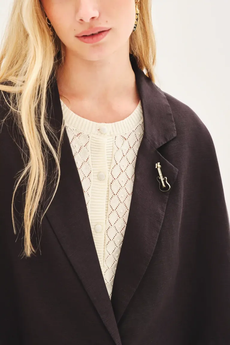 Chaqueta de lino de corte amplio con solapa y detalles de pin de guitarra de Rapsodia en Chaquetas para argentina