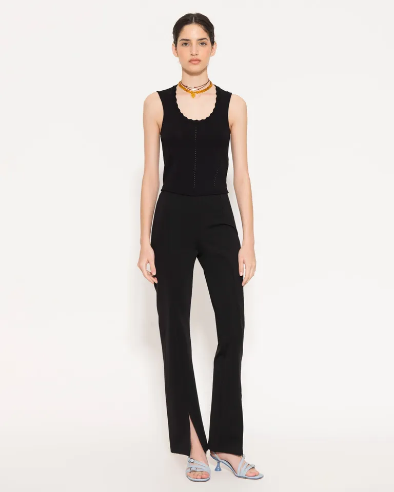 Top negro sin mangas de diseño elegante y contemporáneo para un estilo sofisticado de Jazmin Chebar en Tops para argentina