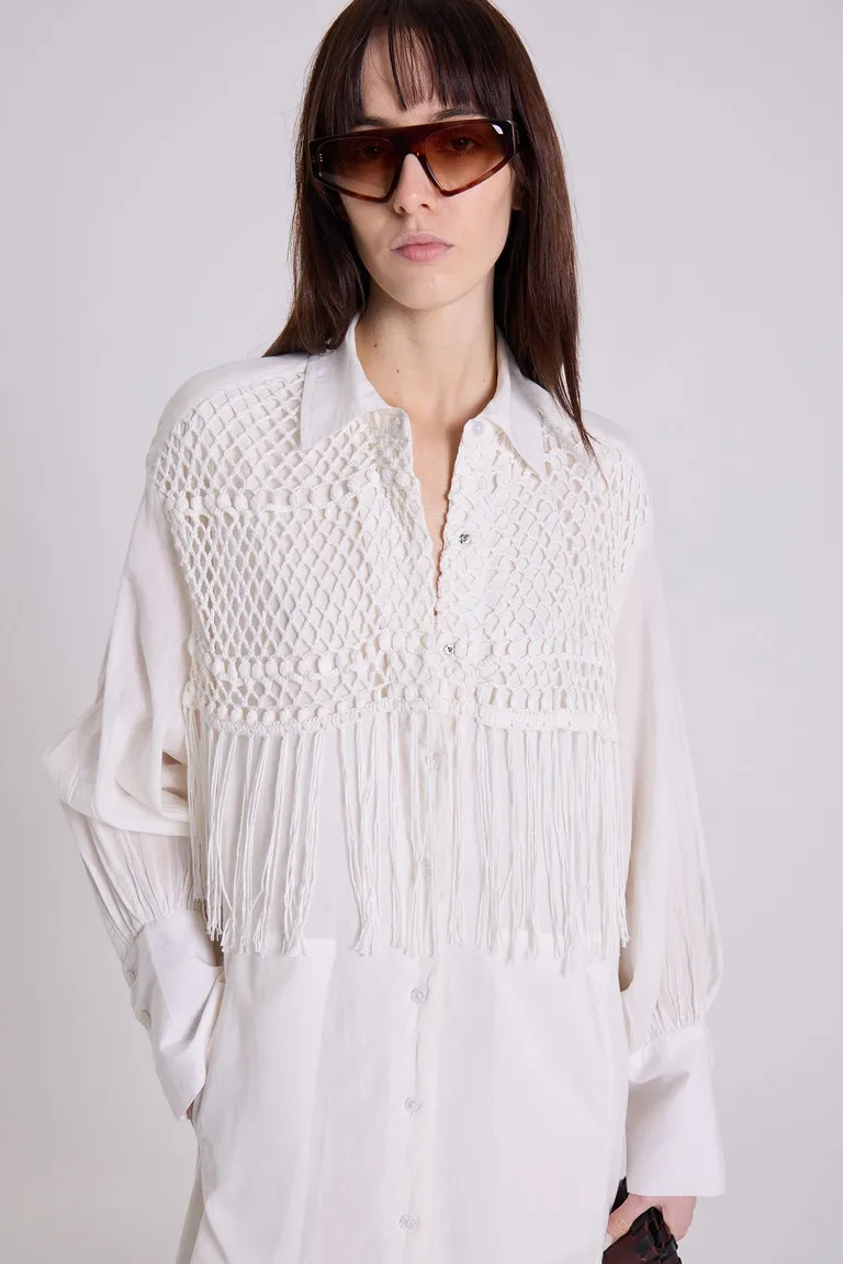 Vestido blanco tipo túnica con pechera de macramé y diseño oversize de Maria Cher en Túnicas para argentina