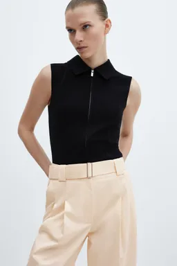 Pantalón pinzas con cinturón de Mango en Pantalones para argentina