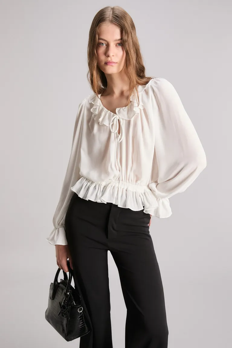 Blusa de seda con volados en cuello, puños y cadera de Kosiuko en Blusas para argentina