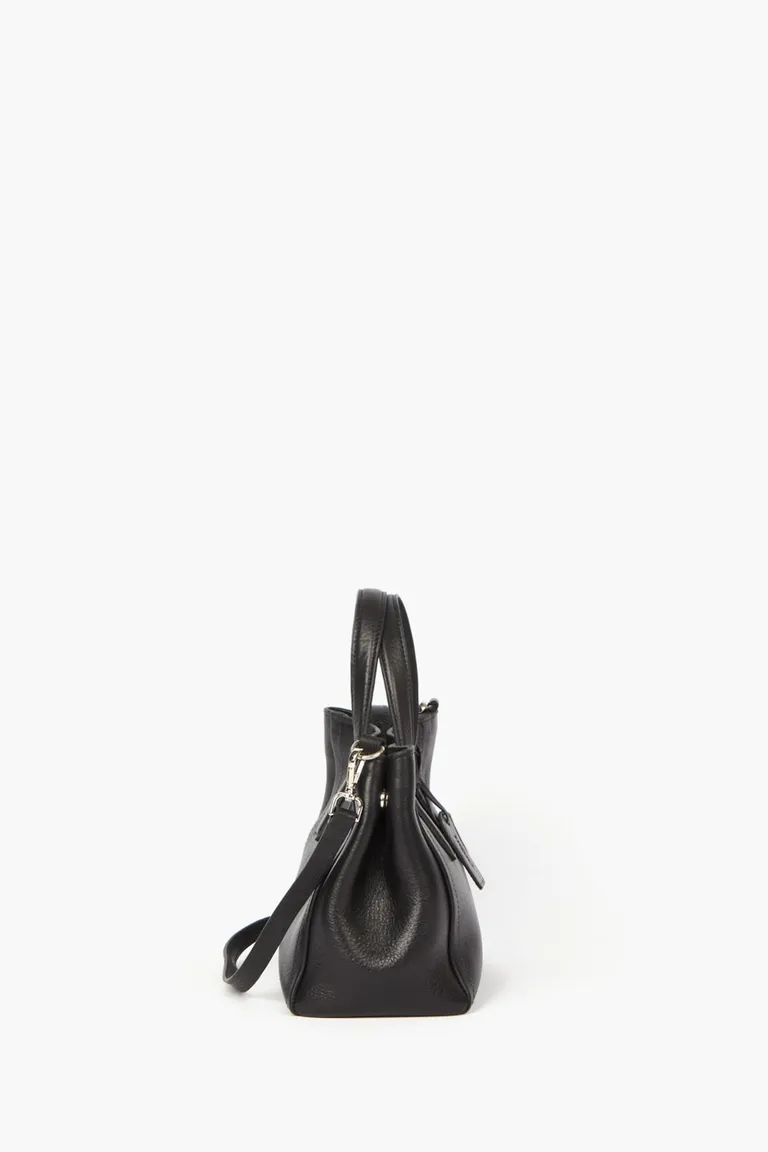 Bolso compacto con doble manija y correa regulable desmontable de Mishka en Bolsos y Carteras para argentina