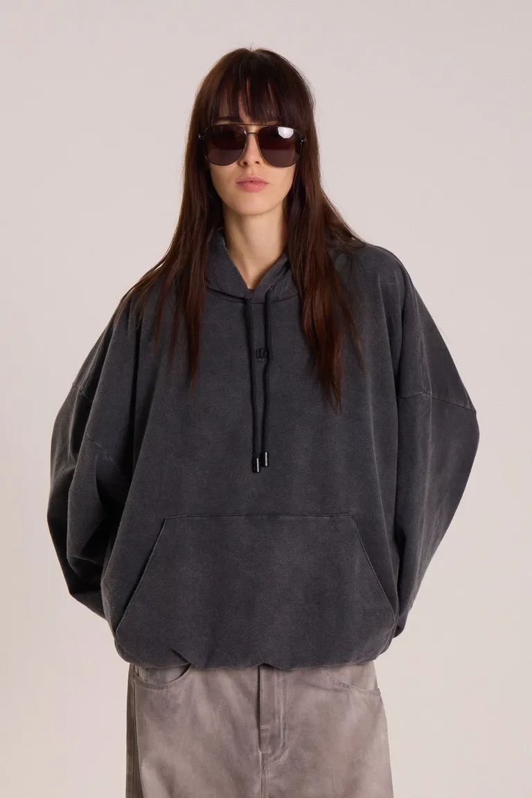 Buzo negro oversize de algodón con capucha y bolsillo canguro de Maria Cher en Buzos y Sweaters para argentina