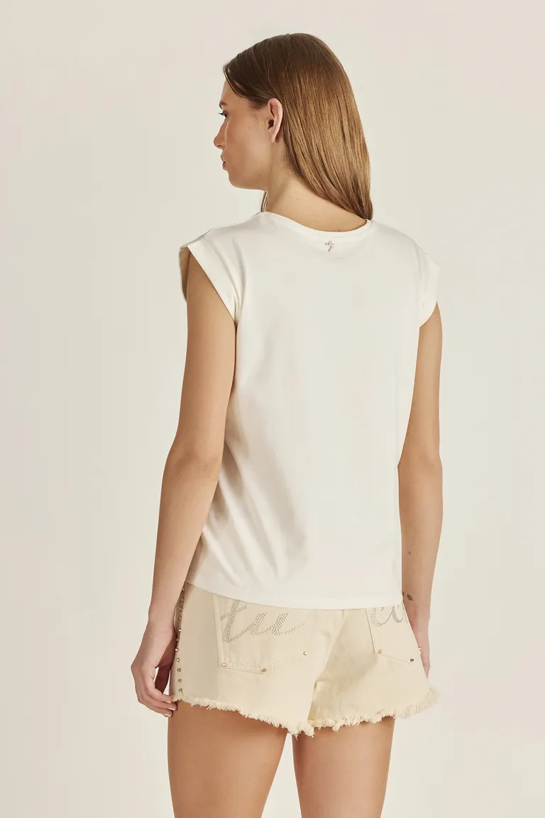 Remera sin mangas con estampa de leopardo y detalles brillantes de Tucci en Remeras para argentina