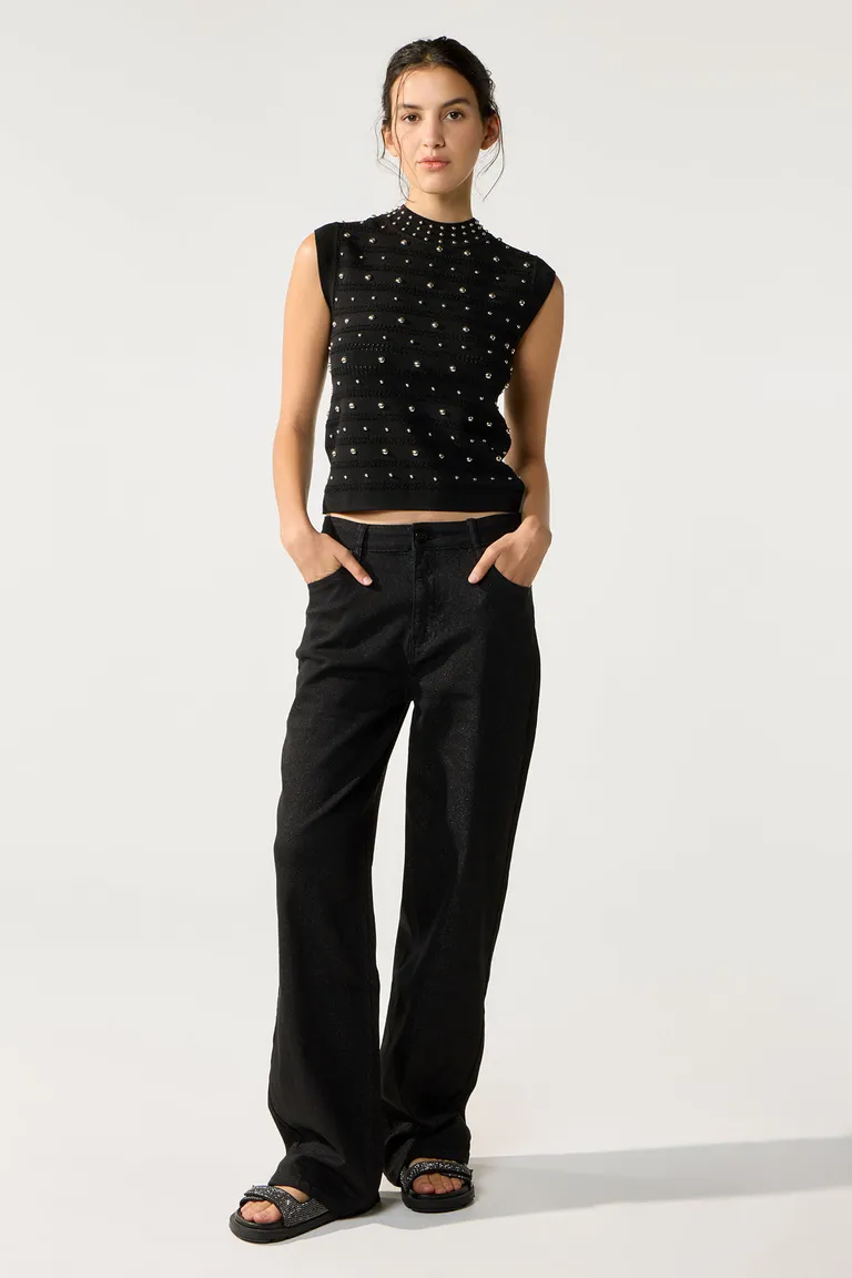 Pantalón negro de denim con detalles de foil plata y tiro alto de Cuesta Blanca en Pantalones para argentina