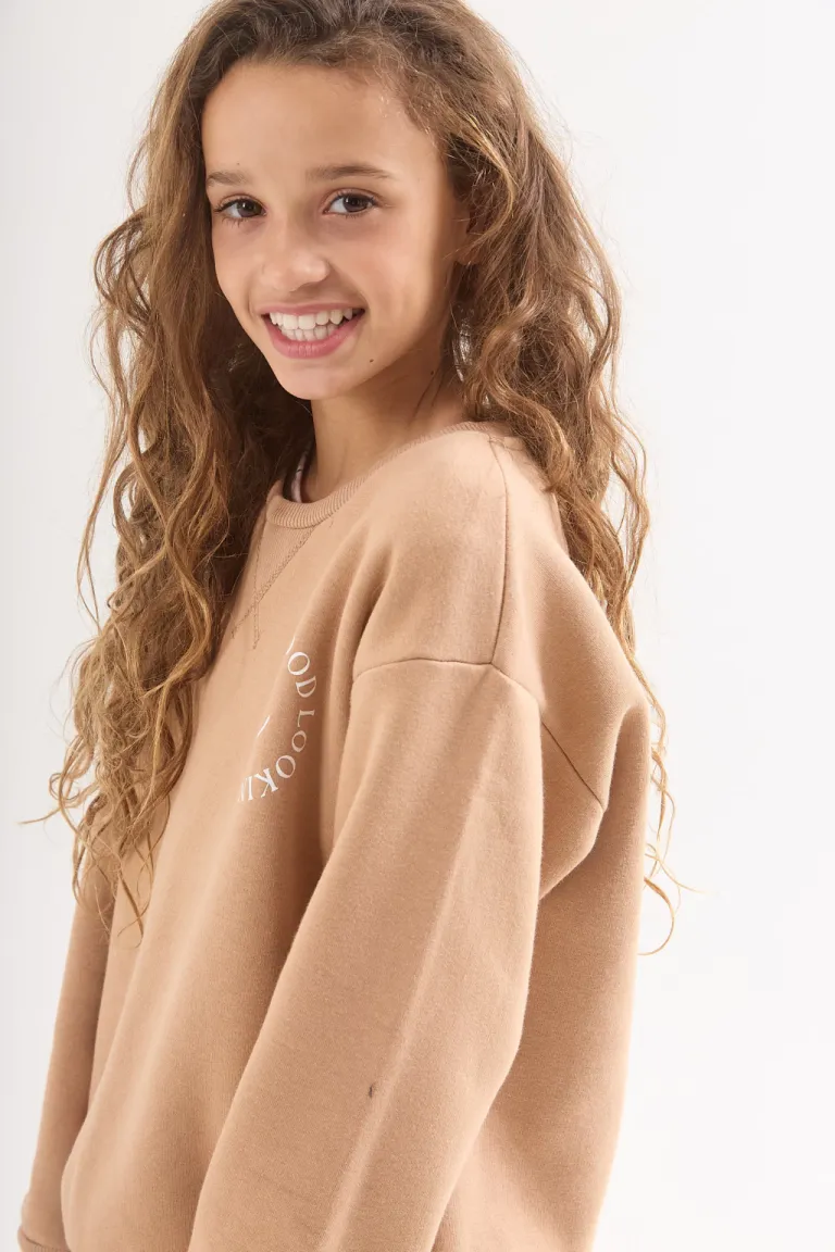 Buzo de frisa negro con diseño sencillo y elegante de Belle en Buzos y Sweaters para argentina