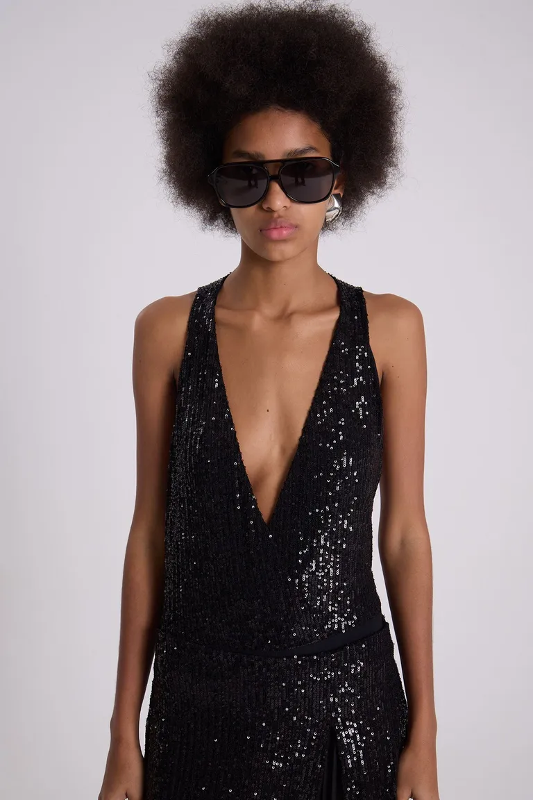 Body negro con lentejuelas, una prenda versátil y elegante para la mujer moderna de Maria Cher en Bodies para argentina
