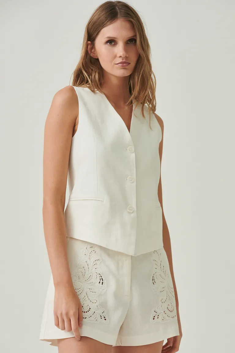 Chaleco blanco de lino corte recto y escote en V para un estilo refinado de Sweet en Chalecos para argentina