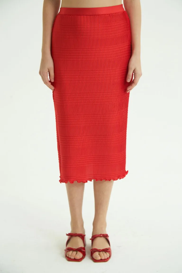 Falda midi de diseño único y elegante con textura plisada y cintura elastizada de Las Pepas en Faldas para argentina