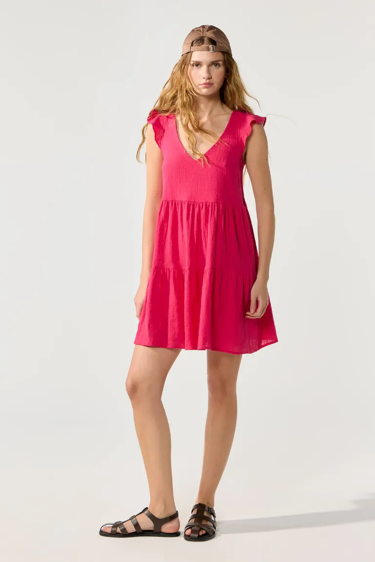 Vestido corto de algodón en tono rosa con escote en V y frunces en la falda de Cuesta Blanca en Vestidos para argentina
