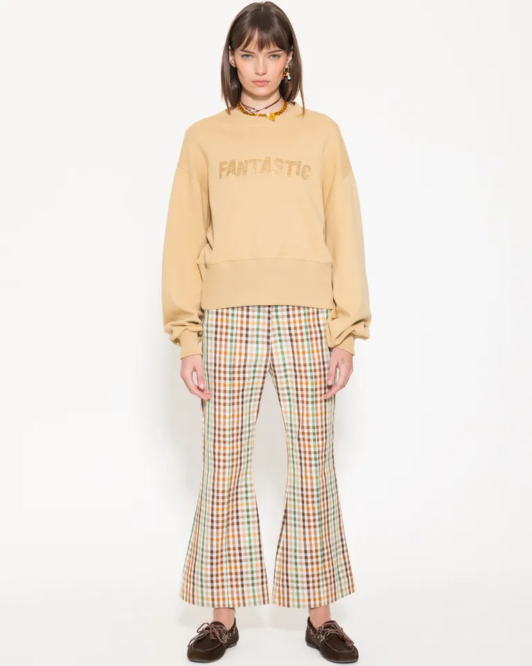 Buzo holgado de punto en un elegante tono amarillo con diseño con destellos de Jazmin Chebar en Buzos y Sweaters para argentina